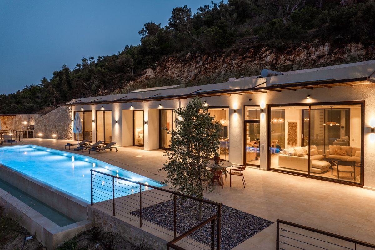 Drone shot of Villa Mulberry nestled in olive groves above the Ionian Sea