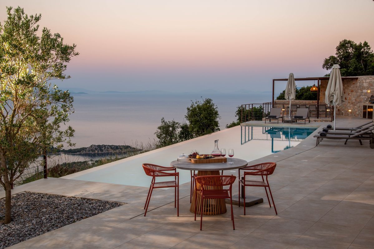 Outdoor breakfast setup with Ionian Sea views at Villa Mulberry