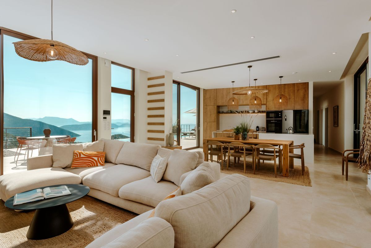 Open-plan living room with floor-to-ceiling windows at Villa Mulberry