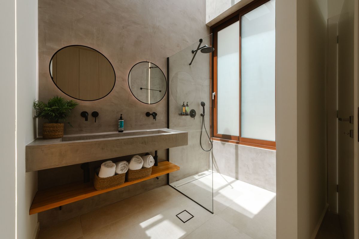 Bathroom interior with walk-in shower at Villa Mulberry