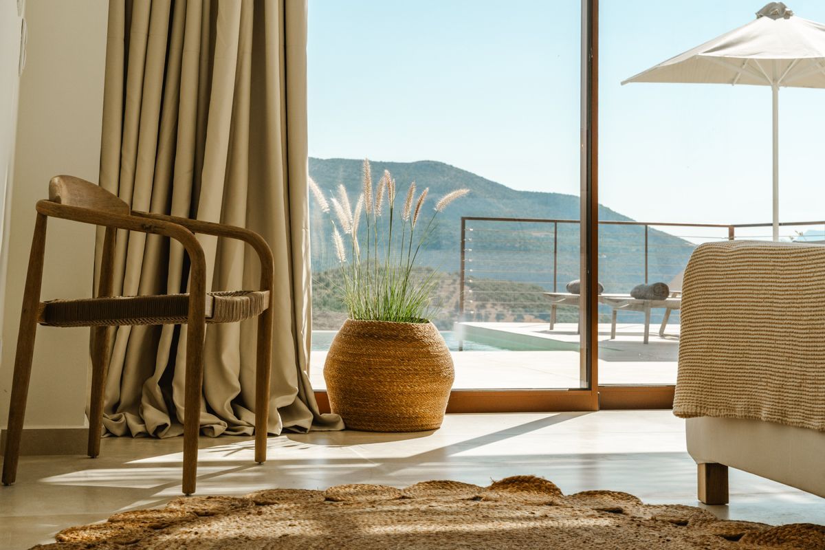Cozy bedroom with natural light at Villa Mulberry Sivota
