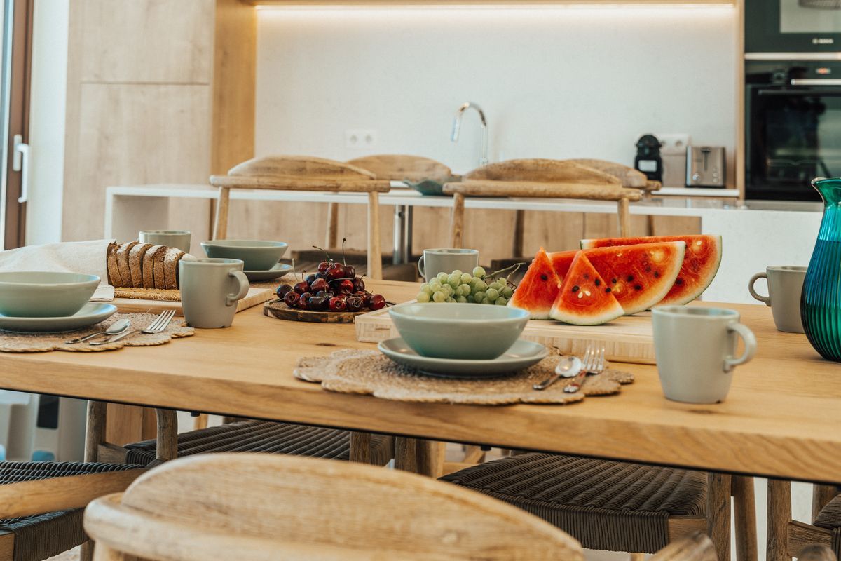 Indoor dining table for 10 guests at Villa Mulberry