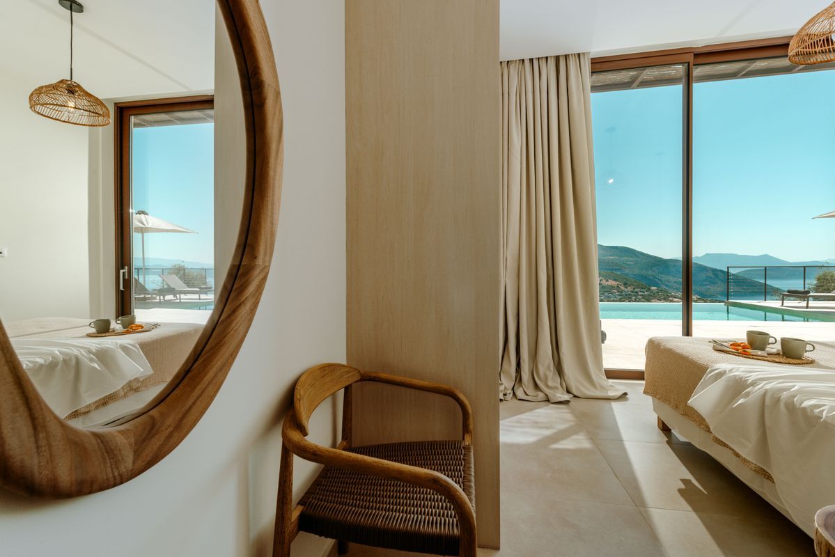 Master double bedroom with ensuite and sea views at Villa Mulberry
